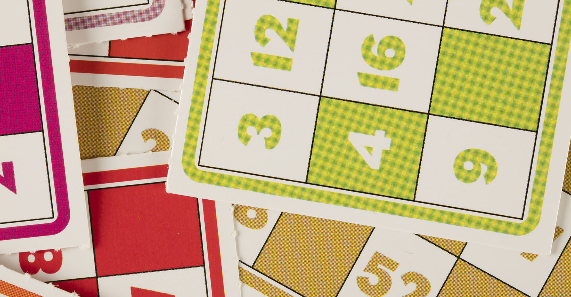 close-up of colorful game cards with numbers on them, Sheaff Brock investment advisors blog, retail consumers